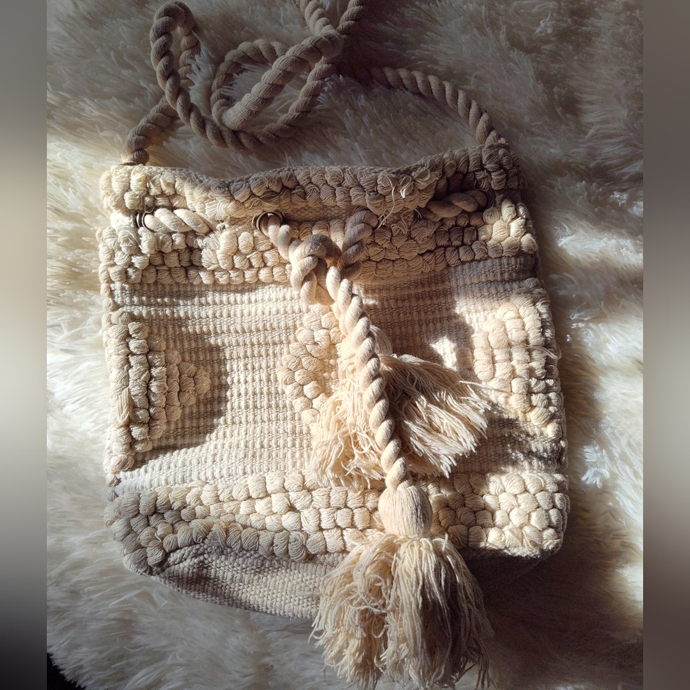 Woven drawstring bucket crossbody bag